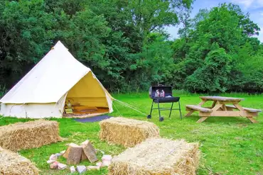 Bell tent (option to upgrade and have a BBQ)