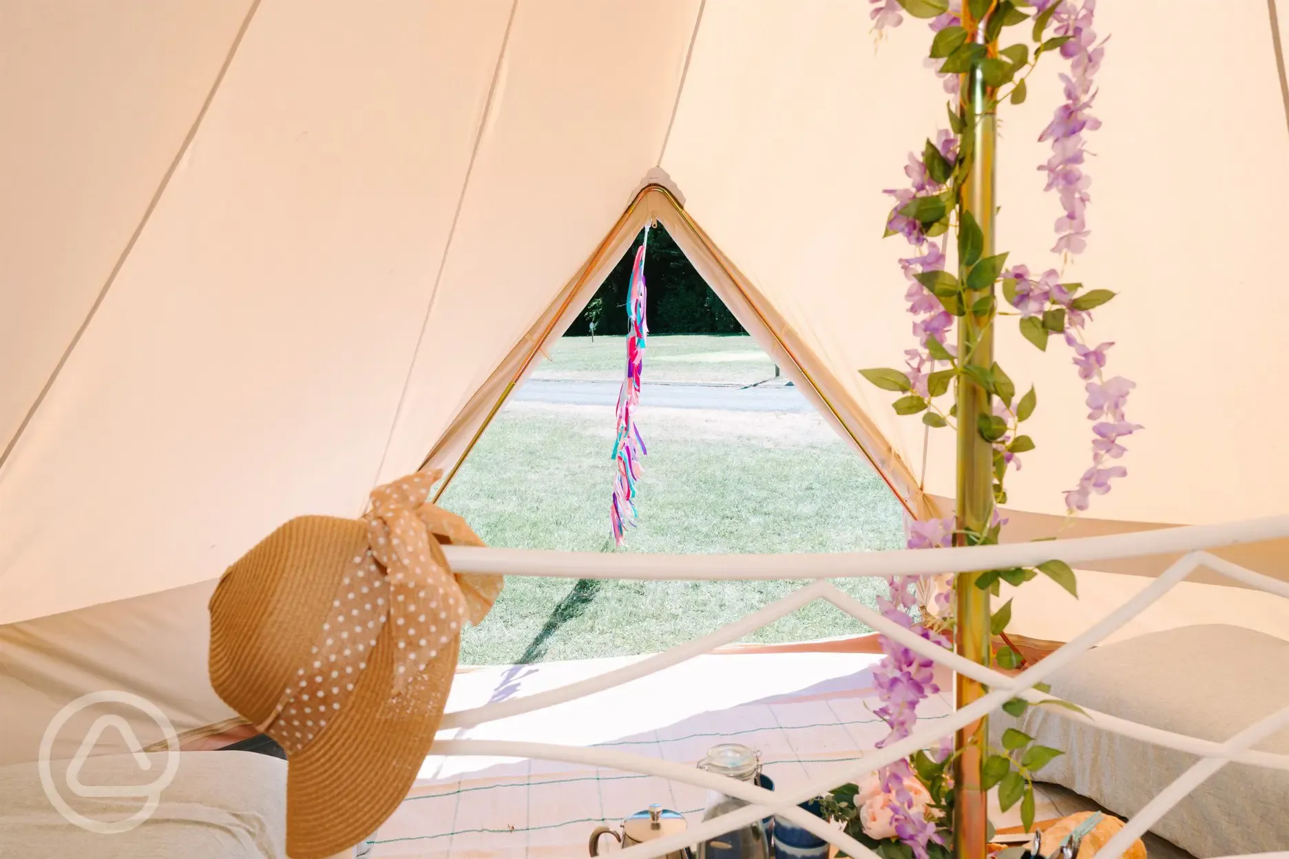 Bell tent with a metal frame double bed