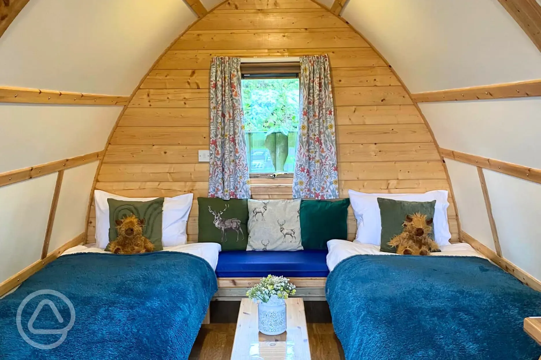 Camping pod with a super king and single convertible seating/beds