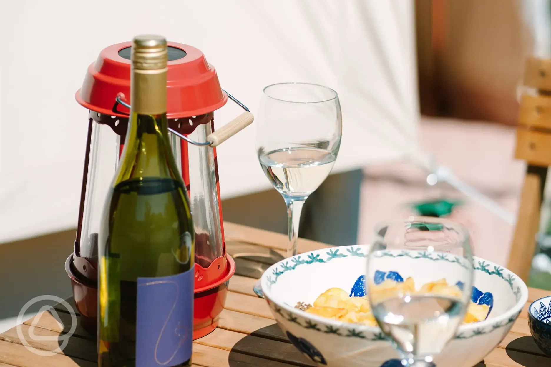 Outdoor seating for the bell tent with solar lights