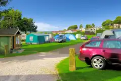 Grass pitches, some with optional 10 amp electric hook ups