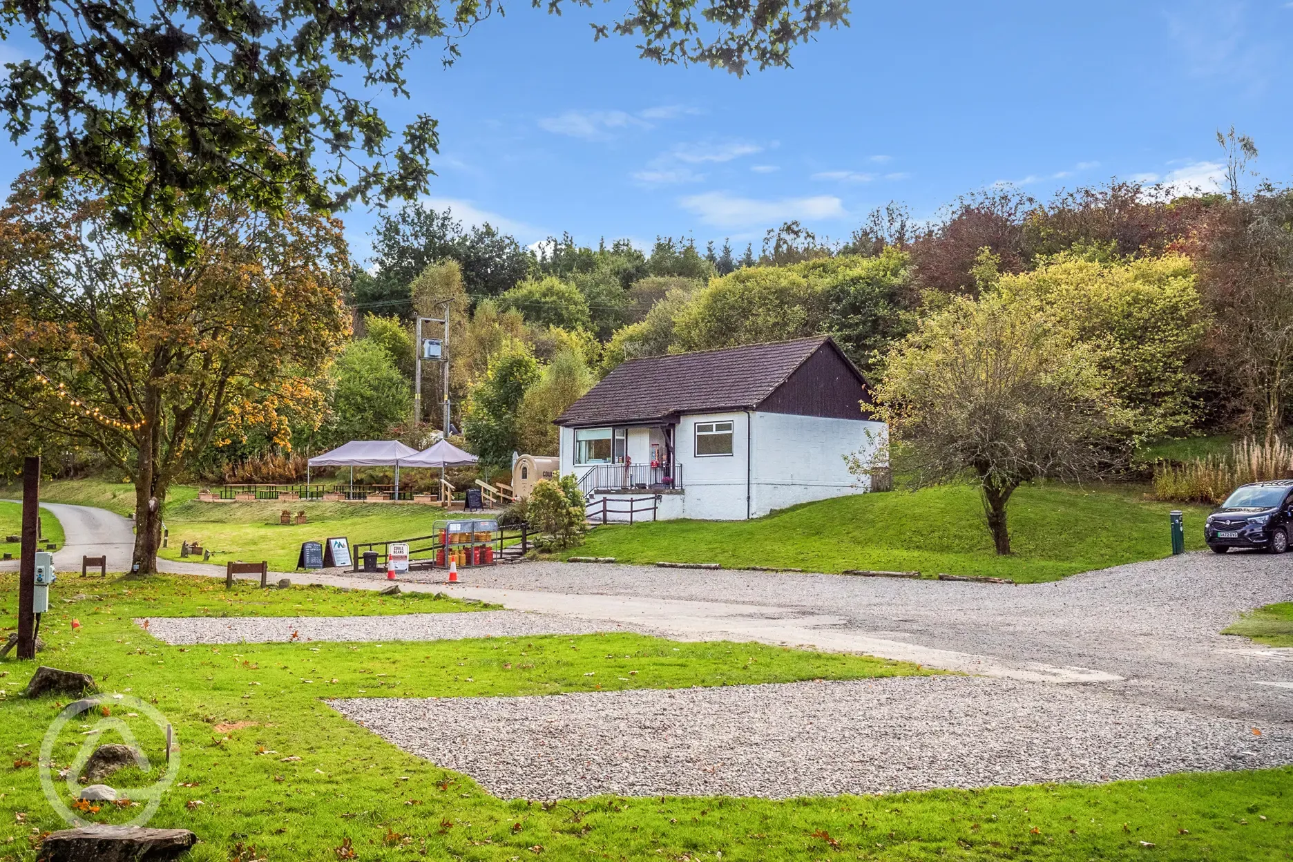 Hardstanding pitches with facilities block behind