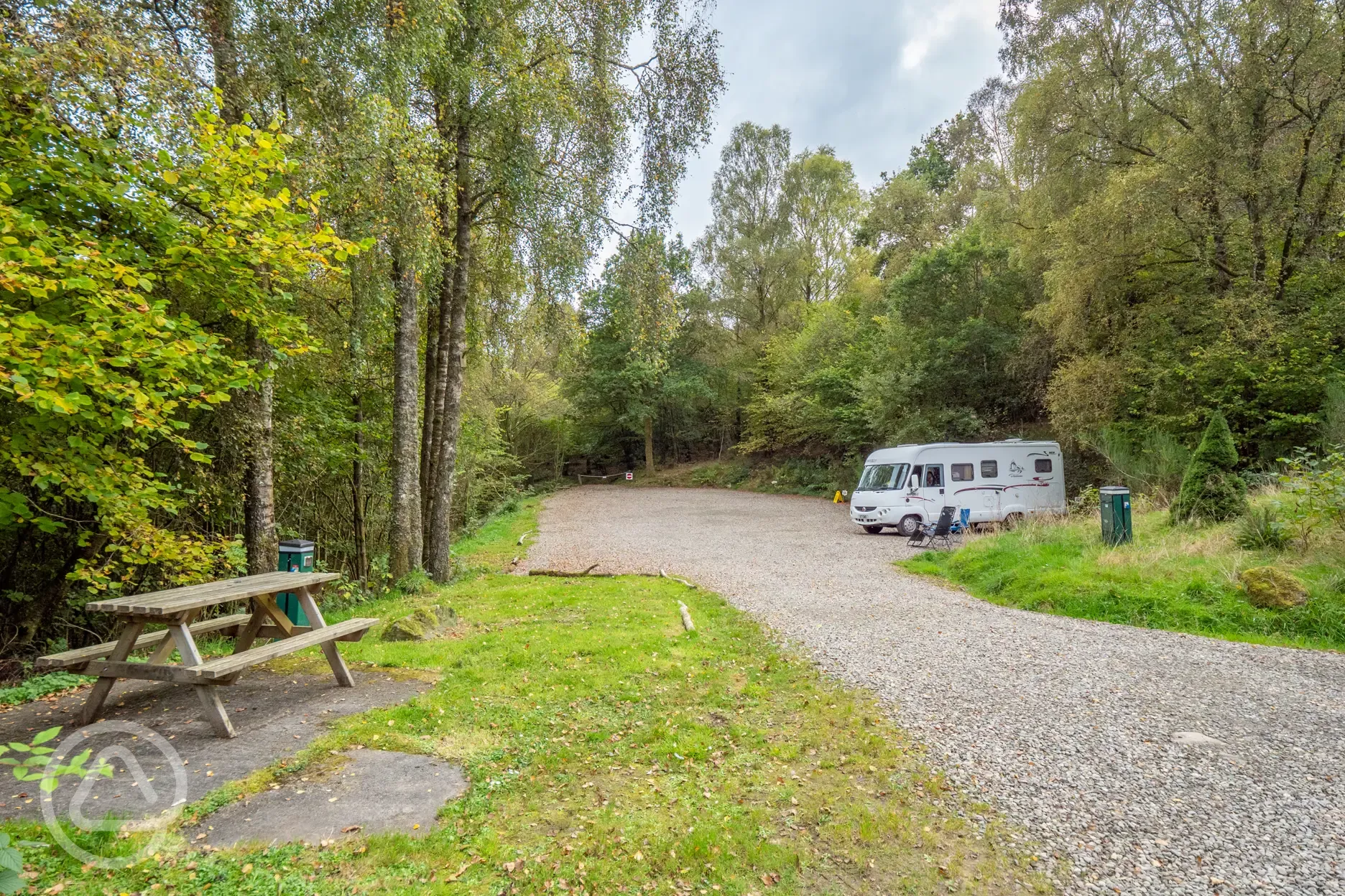 Gravel pitches with picnic bench