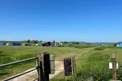 Common End Farm camping field with Peak District views