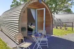 Camping pod with outdoor seating