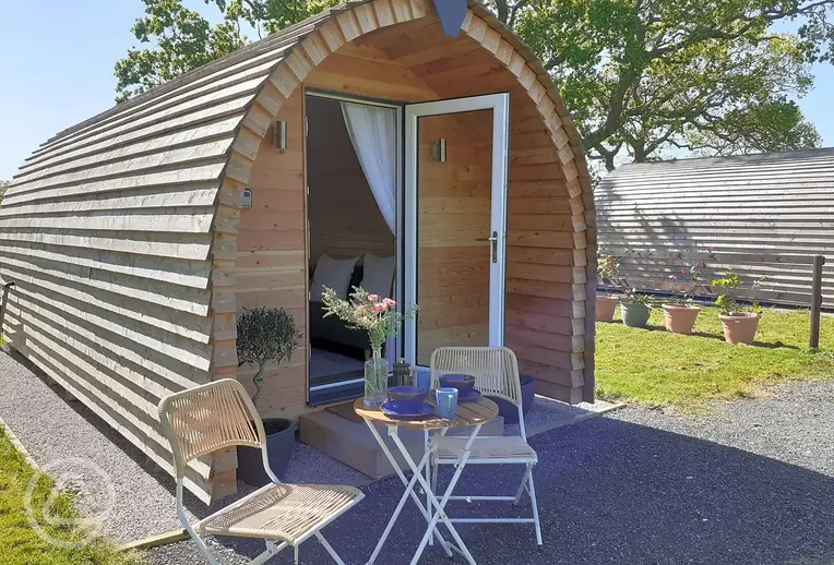 Camping pod with outdoor seating