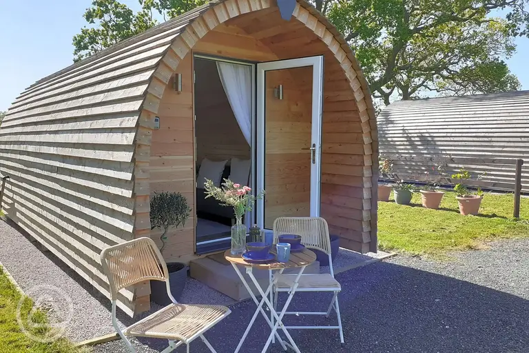 Camping pod with outdoor seating
