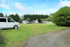 Non electric grass touring pitches measuring 10m by 10m