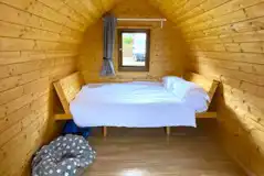 Log pod interior (please bring your own bedding) Log pod interior (please bring your own bedding)