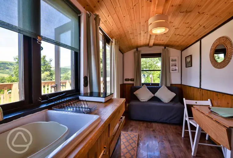 Shepherd's hut with a kitchenette and double sofa bed
