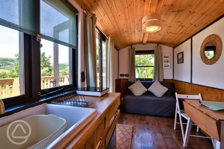 Shepherd's hut with a kitchenette and double sofa bed