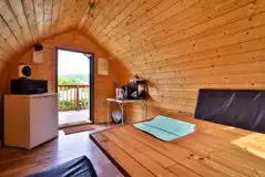 Log pod with a mini fridge, kettle, and electric Log pod with a mini fridge, kettle, and electric