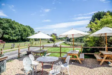 Cafe outdoor seating at the onsite cafe at Dernwood Farm