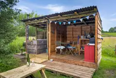 Gypsy caravan cookhouse and Japanese-style hot tub