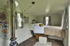 The Herdwick shepherd's hut interior with a double bed