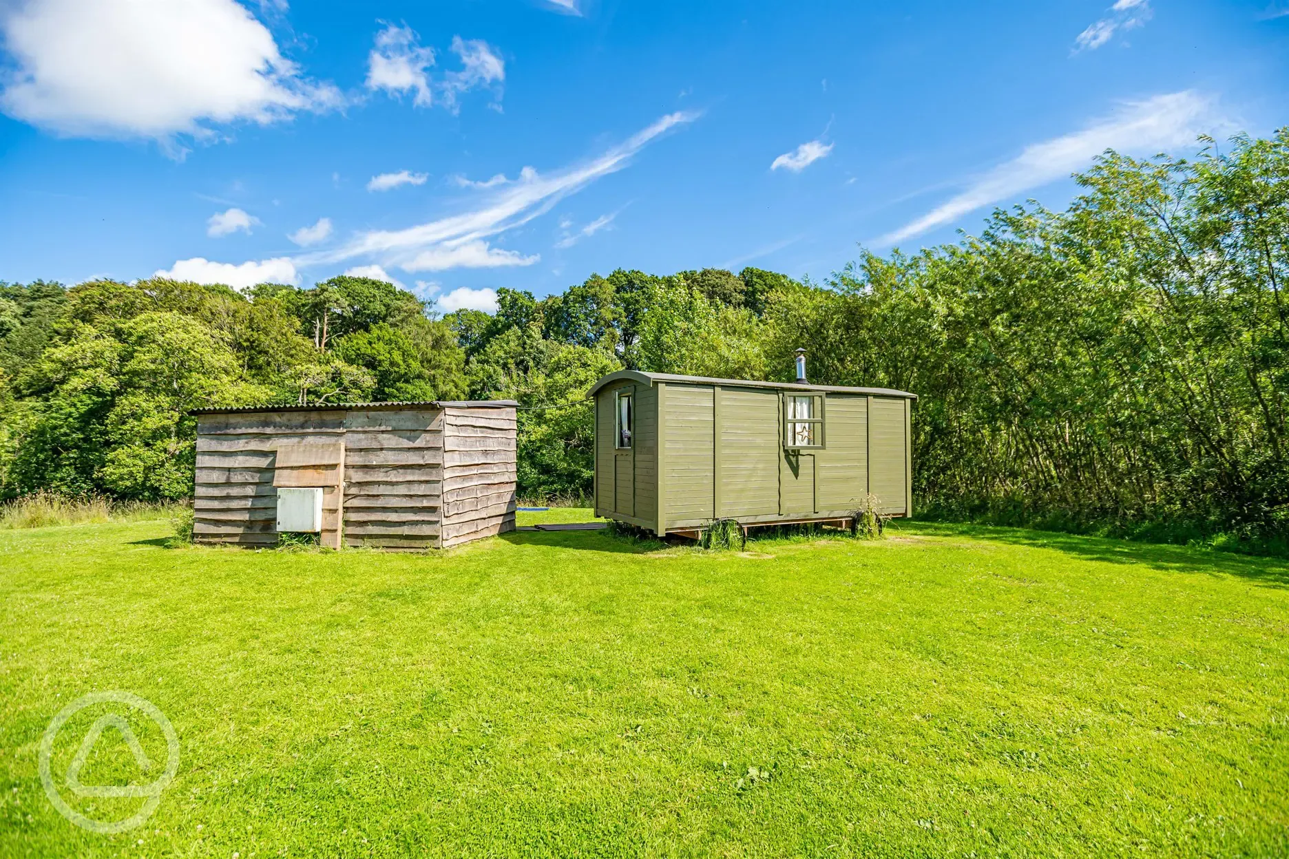 The Herdwick shepherd's hut and sheltered outdoor area