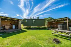The Swaledale shepherd's hut with a sheltered kitchen and wood-fired hot tub