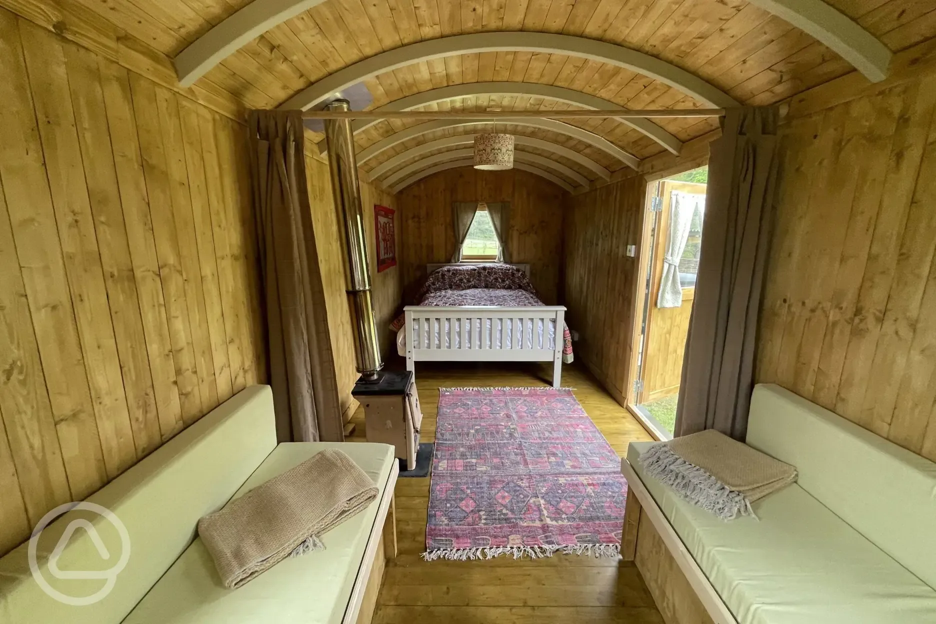 The Swaledale shepherd's hut interior with a double bed