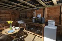 Croglin yurt with a sheltered outdoor kitchen area