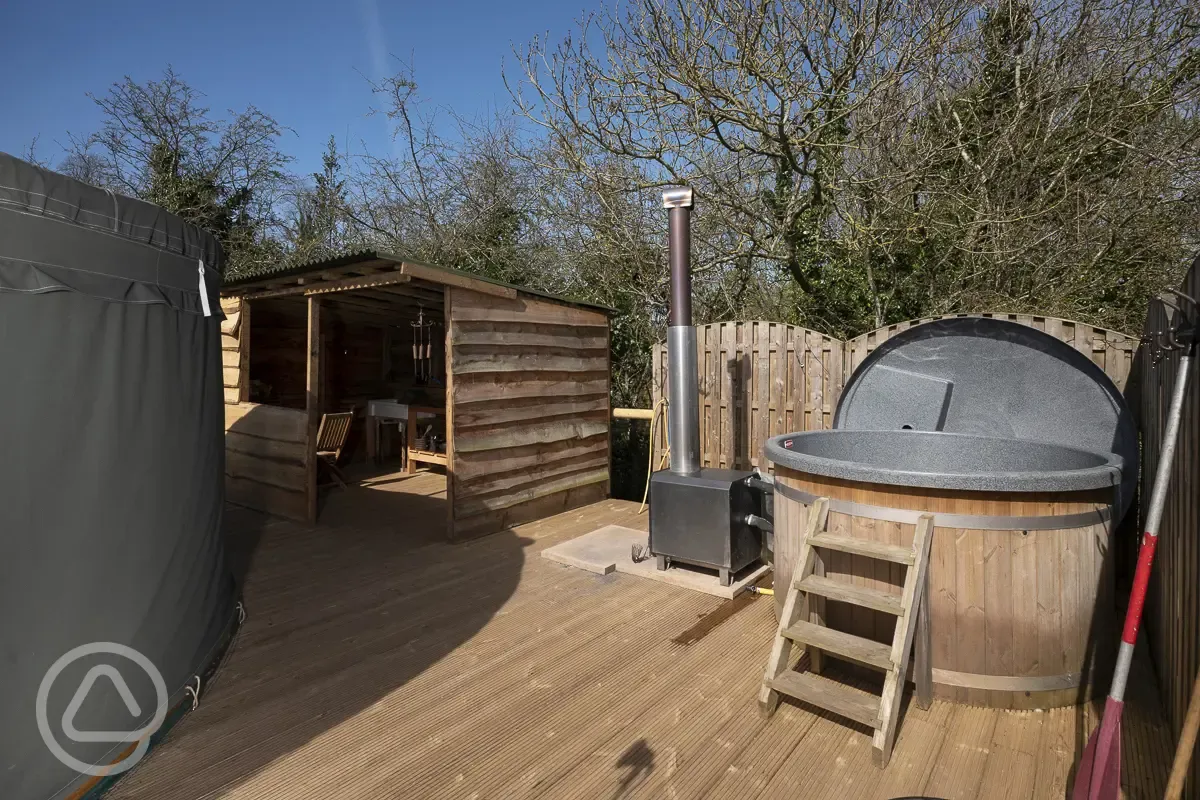 Croglin yurt outdoor deck and private wood-fired hot tub