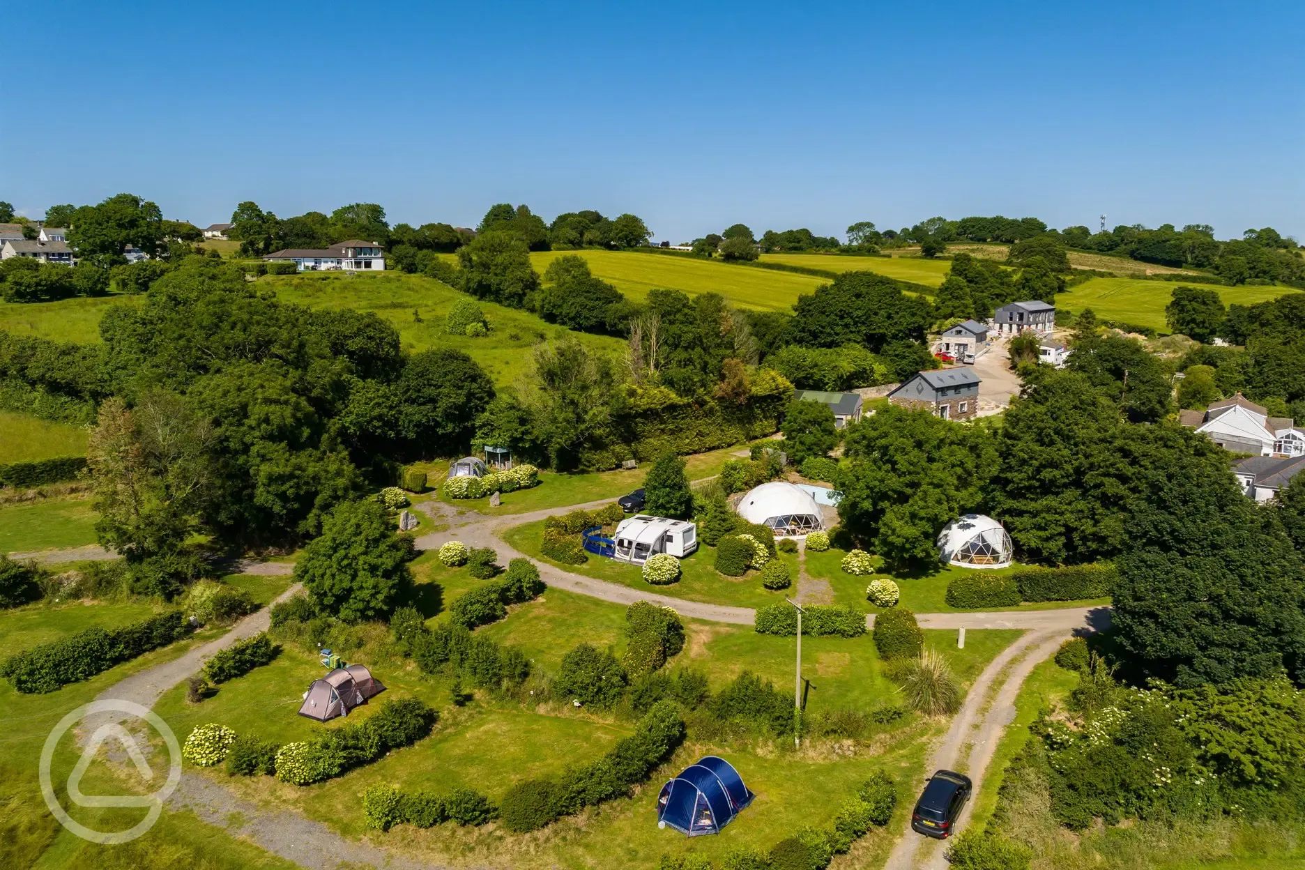 Aerial of East Crinnis camping and glamping area with privacy hedging