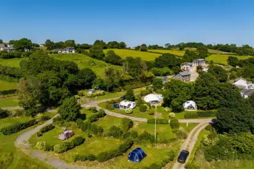 Aerial of East Crinnis camping and glamping area with privacy hedging