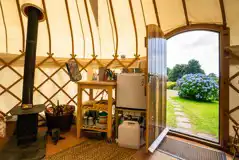 Nare Yurt log burner and kitchen equipment