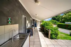 Sheltered outdoor washing up area