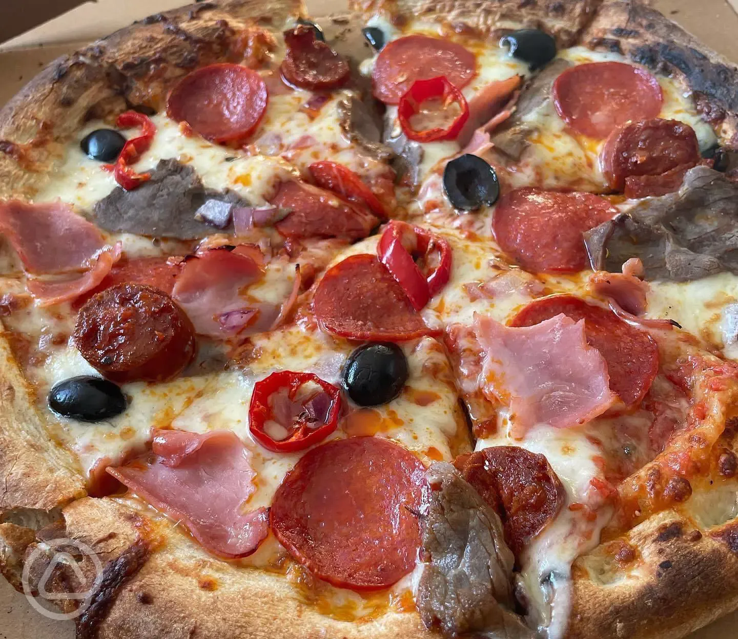 Fresh pizzas from The Shack, open during peak times