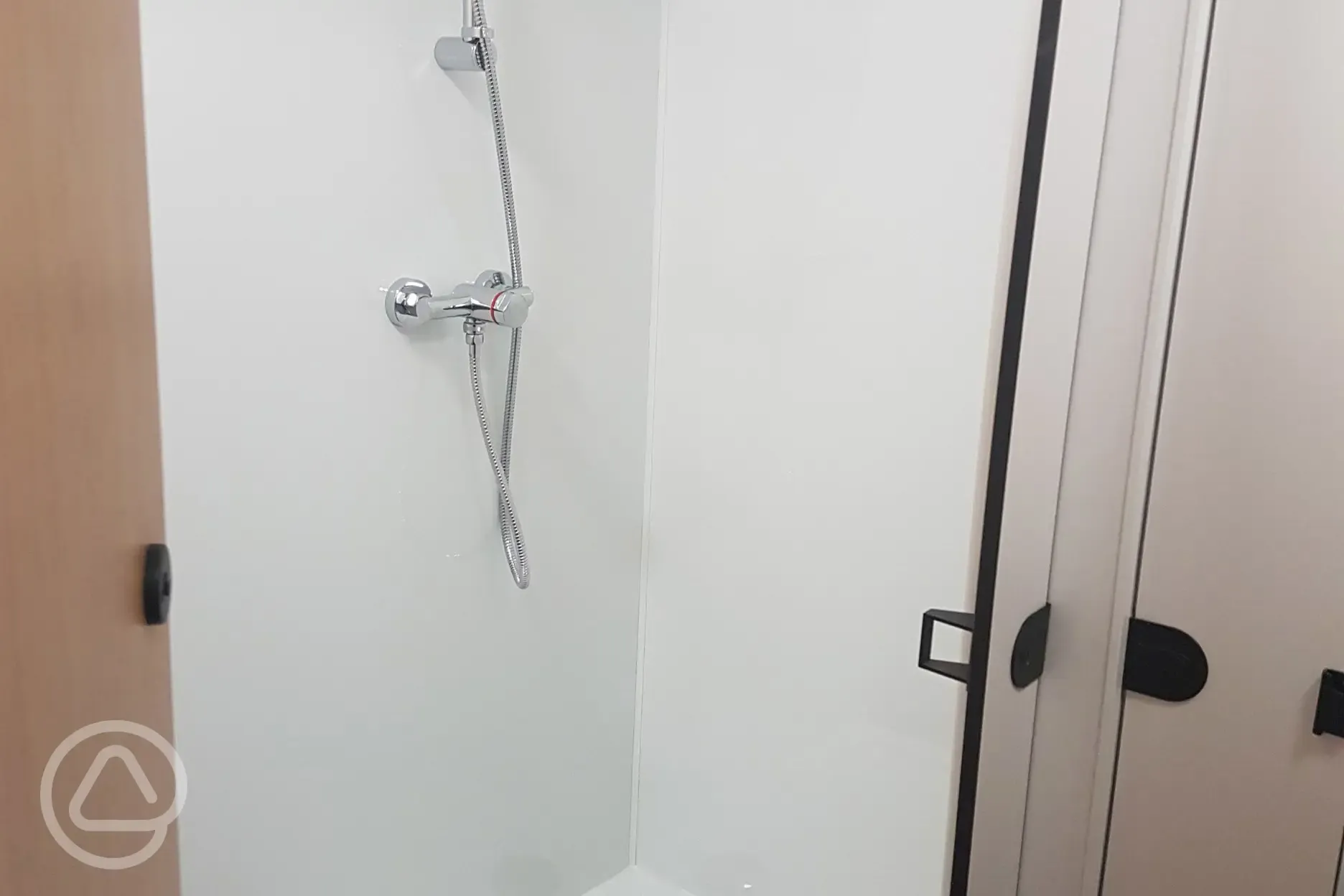 Shared showers at The Loft