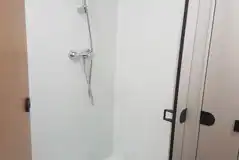 Shared showers at The Loft