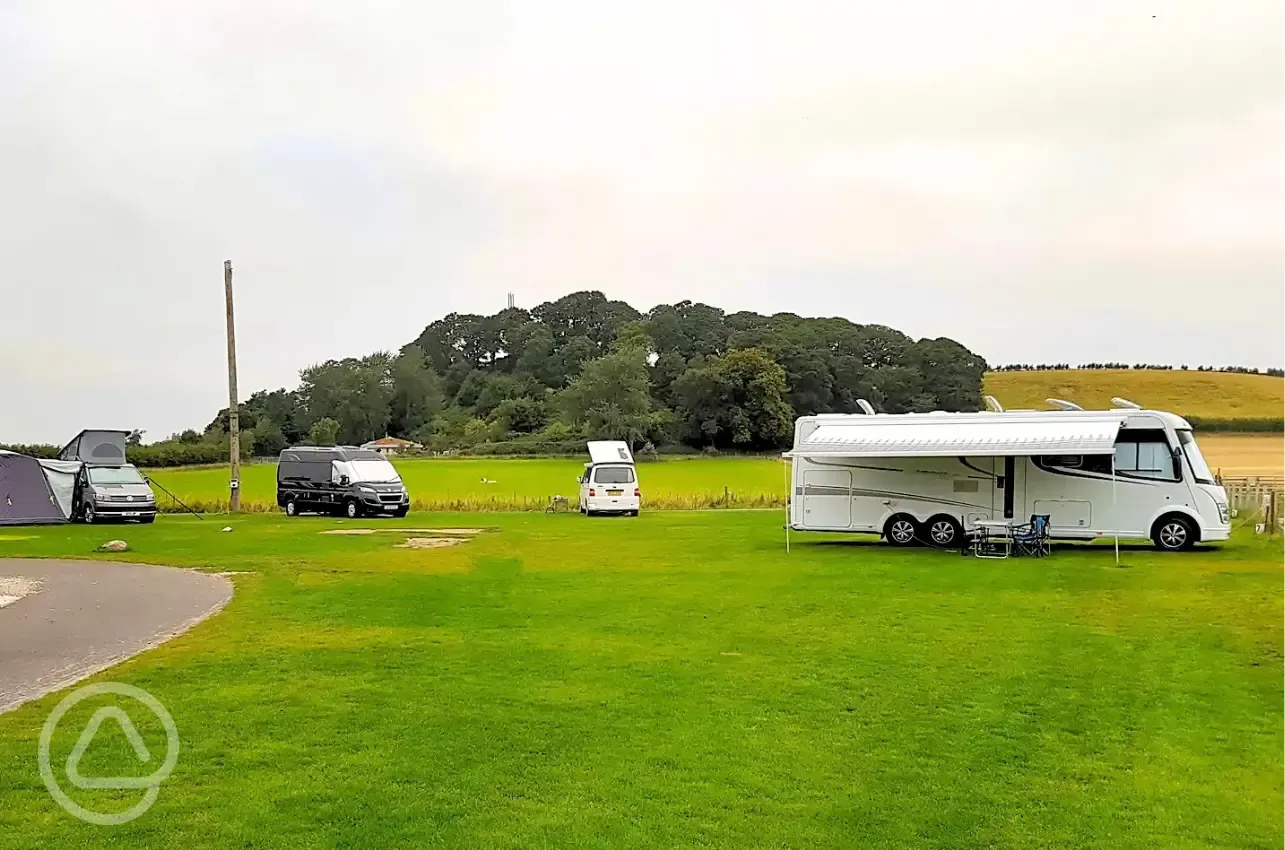 Large electric grass pitches with 16 amp hook up (9m x 11m)