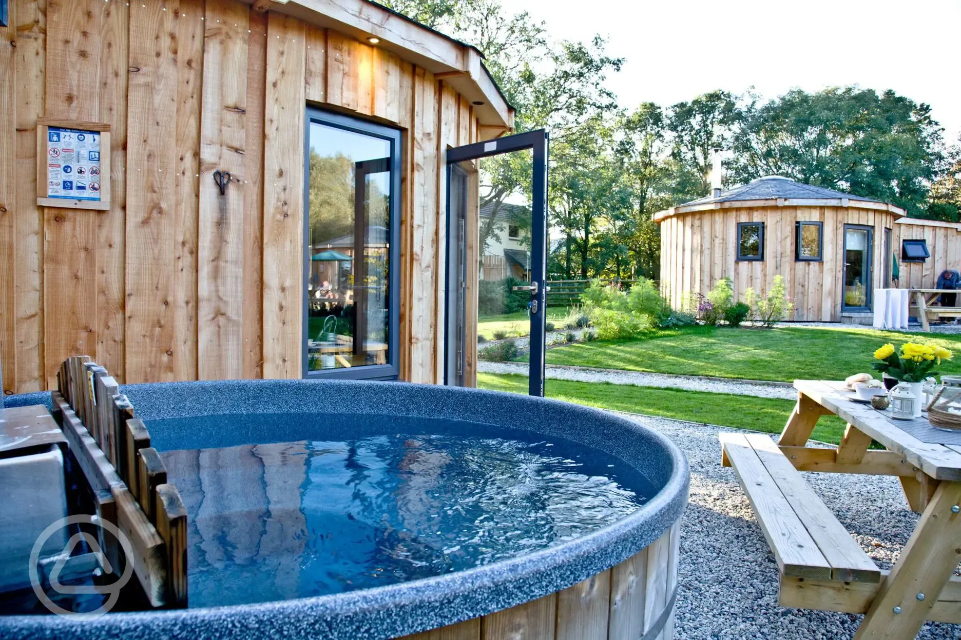 Roundhouses with wood-fired hot tubs