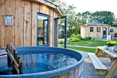 Roundhouses with wood-fired hot tubs Roundhouses with wood-fired hot tubs