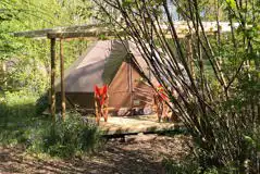 Wild glamping bell tent with covered decking area