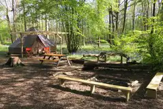 Wild glamping bell tent and outdoor seating area