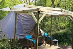 Wild glamping bell tent with covered decking area