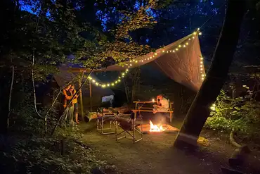 Private fire pit and seating area at night