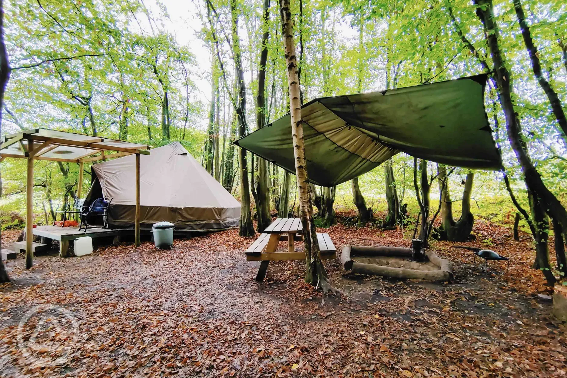 Wild glamping bell tent and outdoor seating area