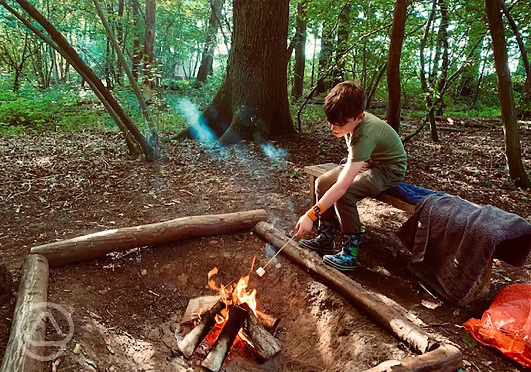 Camper toasting marshmallows