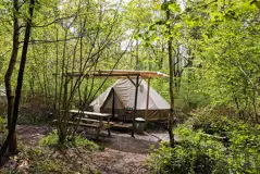 Wild glamping bell tent with covered decking area