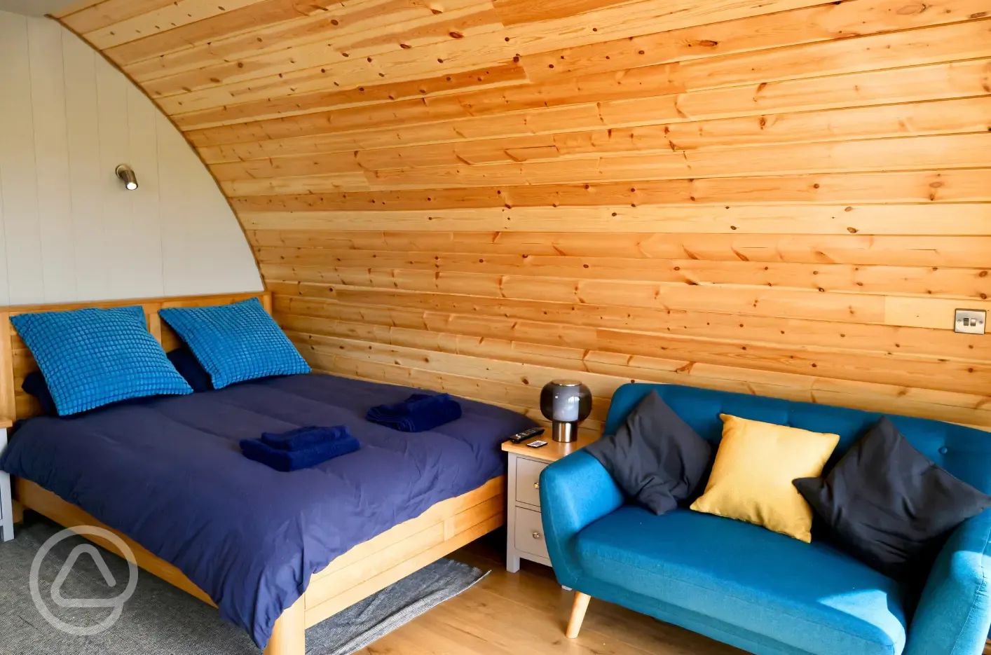 Glamping pod double bed and double futon bed
