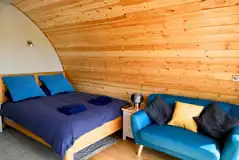 Glamping pod double bed and double futon bed Glamping pod double bed and double futon bed