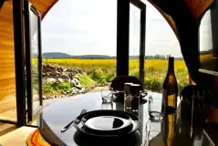Glamping pod dining table and view Glamping pod dining table and view