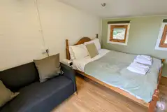 Eco Aspen cabin with a double bed and sofa Eco Aspen cabin with a double bed and sofa