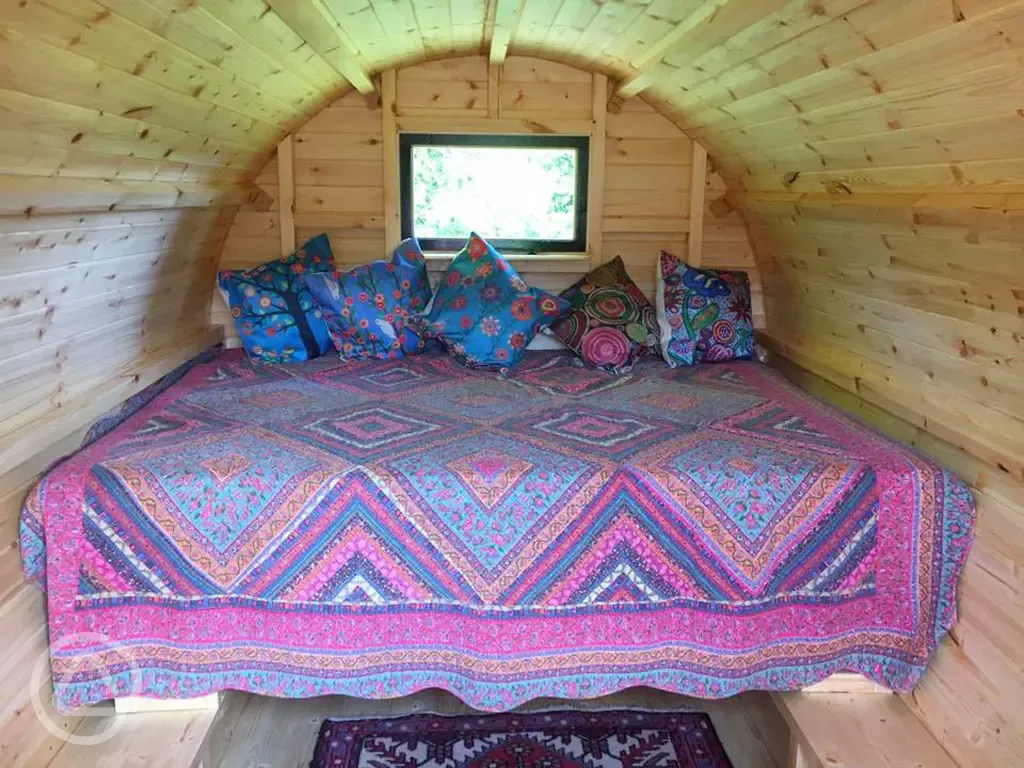 Interior of gypsy caravan Five Wyches Farm campsite