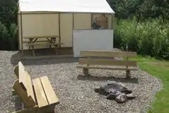 Covered kitchen, seating and fire pit Covered kitchen, seating and fire pit