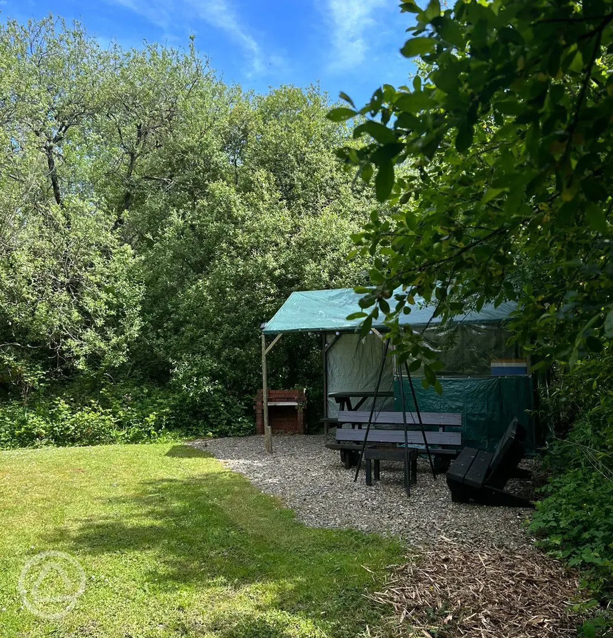 Covered kitchen, seating and fire pit