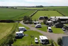 Aerial view of Bamburgh Touring Caravans at Fowberry Farm