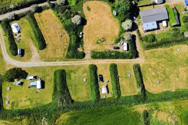 Birds eye view of grass pitches at Abercastle Campsite